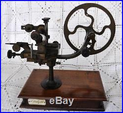 Antique Watchmakers rounding up gear cutter lathe