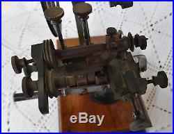 Antique Watchmakers rounding up gear cutter lathe