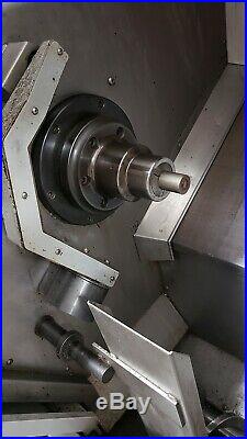 HAAS SL-20T CNC Turning Center Lathe with Live Tooling. Loaded! (2005) HAAS SL-20T CNC Turning Center Lathe with Live Tooling. Loaded! (2005)