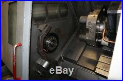 Haas TL-15 CNC Lathe, live tool machine with barfeeder, conveyor, parts catcher